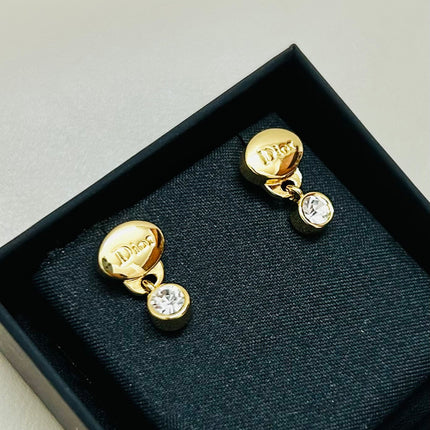 CD 26S CRYSTAL DROP LOGO STUD EARRINGS IN GOLD TONE METAL 646613