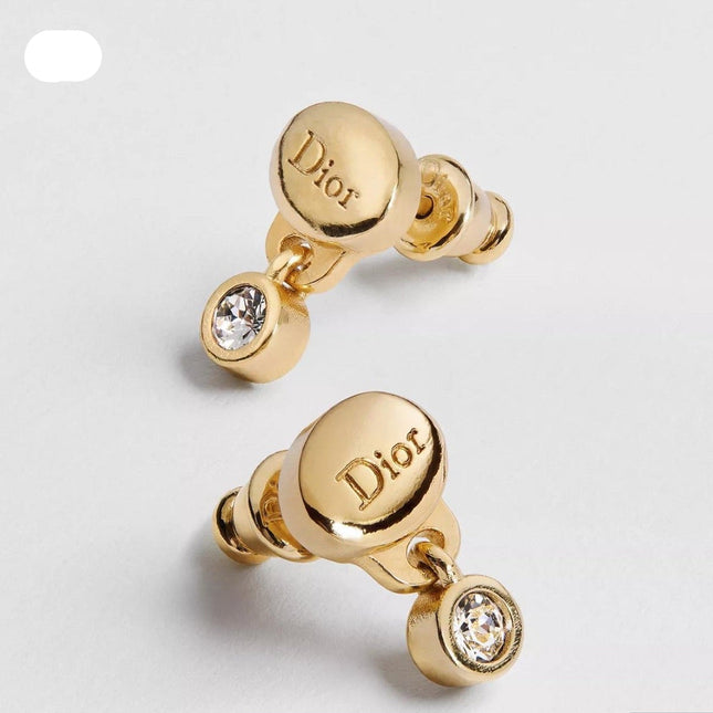 CD 26S CRYSTAL DROP LOGO STUD EARRINGS IN GOLD TONE METAL 646613