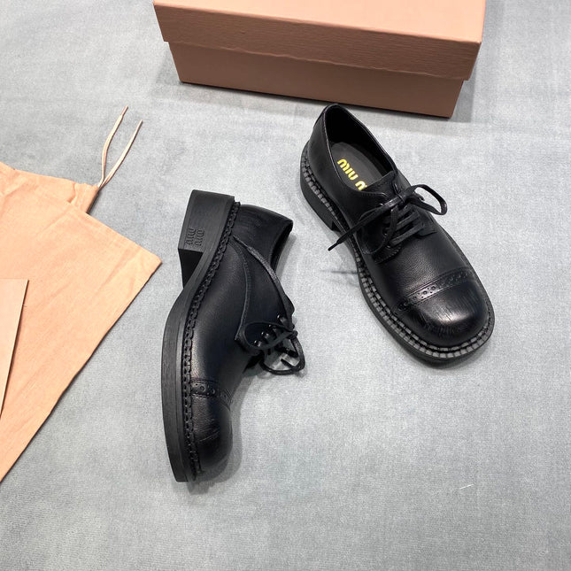 MIUMIU 26S LACE-UP LOAFERS IN BLACK GRAINED CALFSKIN