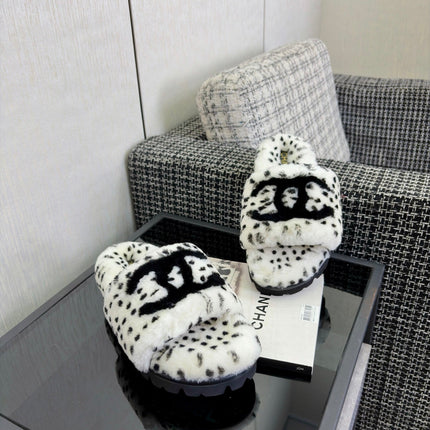 CHANEL 26S PLATFORM SLIDE SANDALS IN WHITE AND BLACK SHEARLING DALMATIAN PRINT