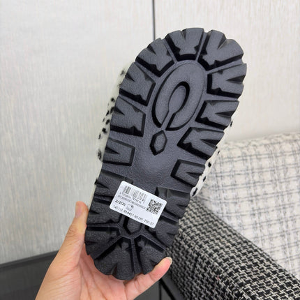 CHANEL 26S PLATFORM SLIDE SANDALS IN WHITE AND BLACK SHEARLING DALMATIAN PRINT