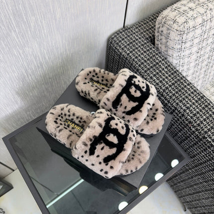 CHANEL 26S PLATFORM SLIDE SANDALS IN GRAY AND BLACK SHEARLING DALMATIAN PRINT