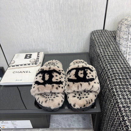 CHANEL 26S PLATFORM SLIDE SANDALS IN GRAY AND BLACK SHEARLING DALMATIAN PRINT