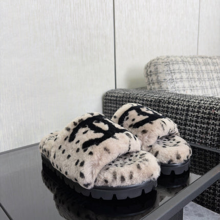 CHANEL 26S PLATFORM SLIDE SANDALS IN GRAY AND BLACK SHEARLING DALMATIAN PRINT