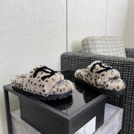 CHANEL 26S PLATFORM SLIDE SANDALS IN GRAY AND BLACK SHEARLING DALMATIAN PRINT