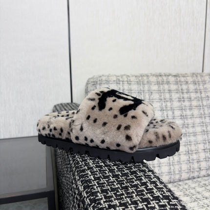 CHANEL 26S PLATFORM SLIDE SANDALS IN GRAY AND BLACK SHEARLING DALMATIAN PRINT