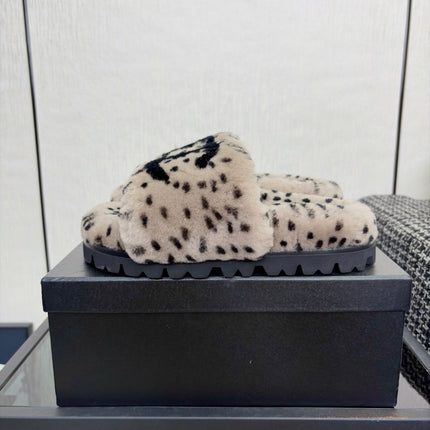 CHANEL 26S PLATFORM SLIDE SANDALS IN GRAY AND BLACK SHEARLING DALMATIAN PRINT