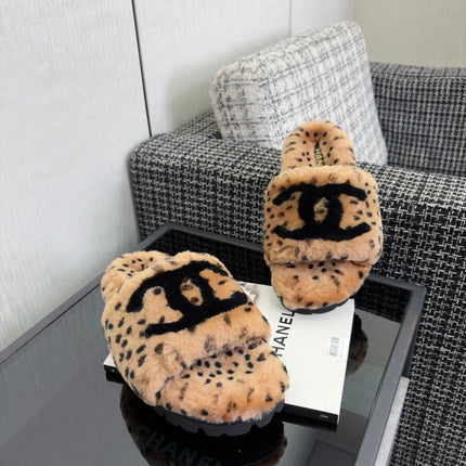 CHANEL 26S PLATFORM SLIDE SANDALS IN CAMEL AND BLACK SHEARLING DALMATIAN PRINT