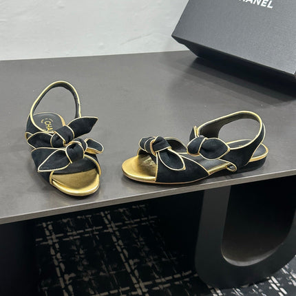 CHANEL 26S BOW SANDALS IN BLACK MIX GOLD SATIN