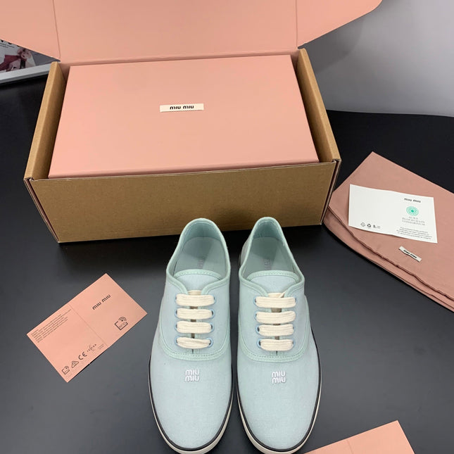 MIUMIU 26S LACE UP SNEAKERS IN PALE MINT CANVAS RUBBER SOLE