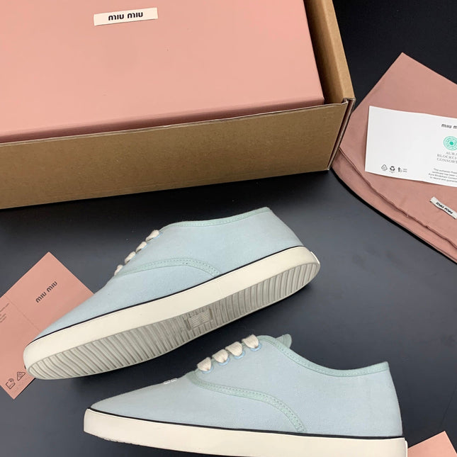 MIUMIU 26S LACE UP SNEAKERS IN PALE MINT CANVAS RUBBER SOLE