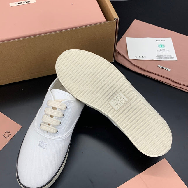 MIUMIU 26S LACE UP SNEAKERS IN WHITE CANVAS RUBBER SOLE