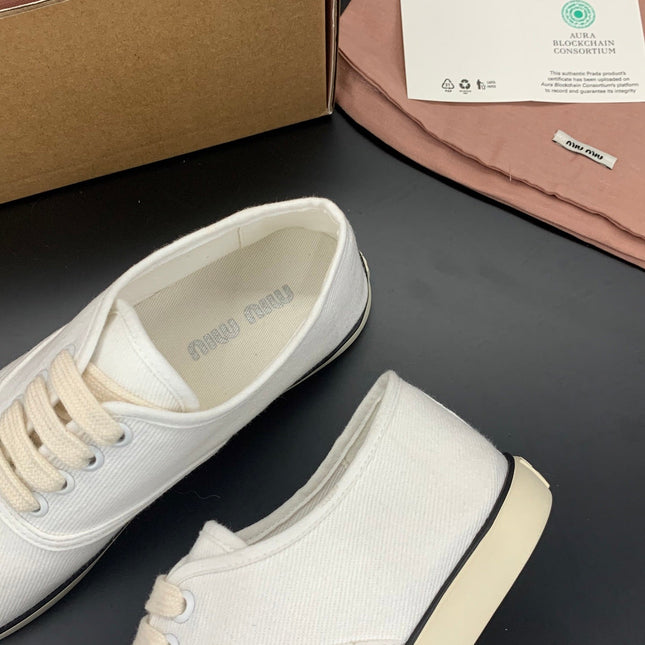 MIUMIU 26S LACE UP SNEAKERS IN WHITE CANVAS RUBBER SOLE