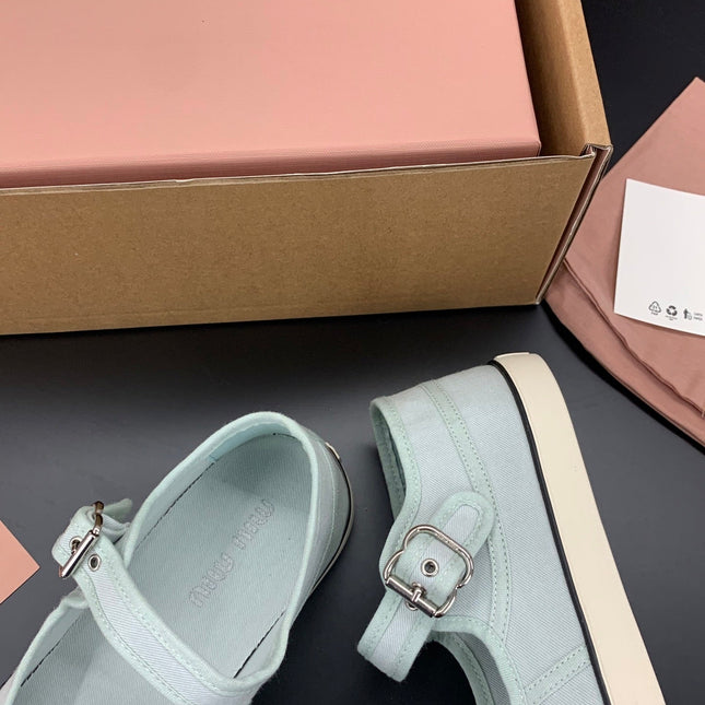 MIUMIU 26S MARY JANE FLATS IN PALE MINT CANVAS LOGO