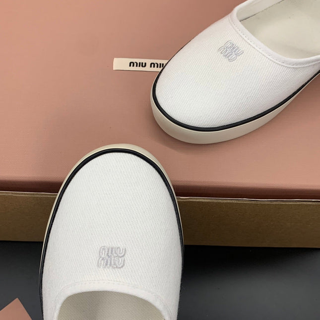 MIUMIU 26S MARY JANE FLATS IN WHITE CANVAS LOGO