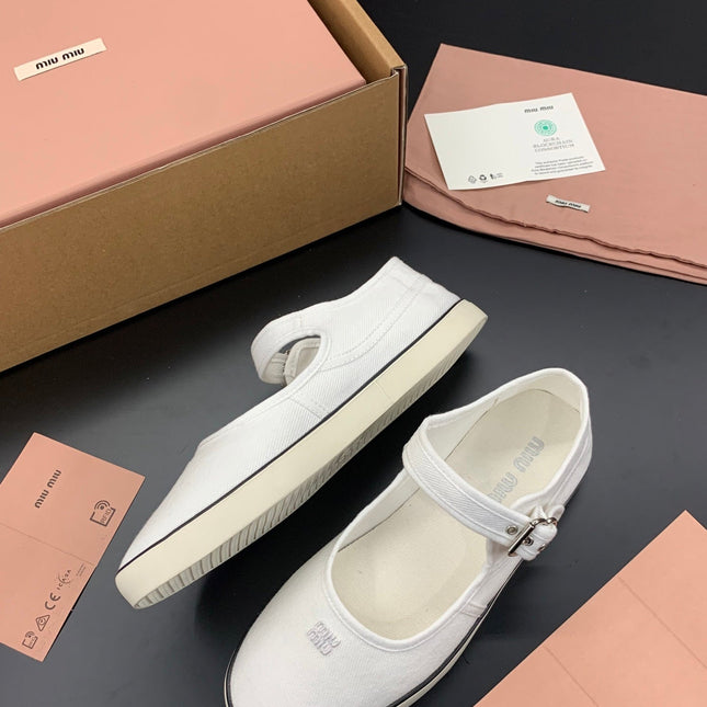 MIUMIU 26S MARY JANE FLATS IN WHITE CANVAS LOGO