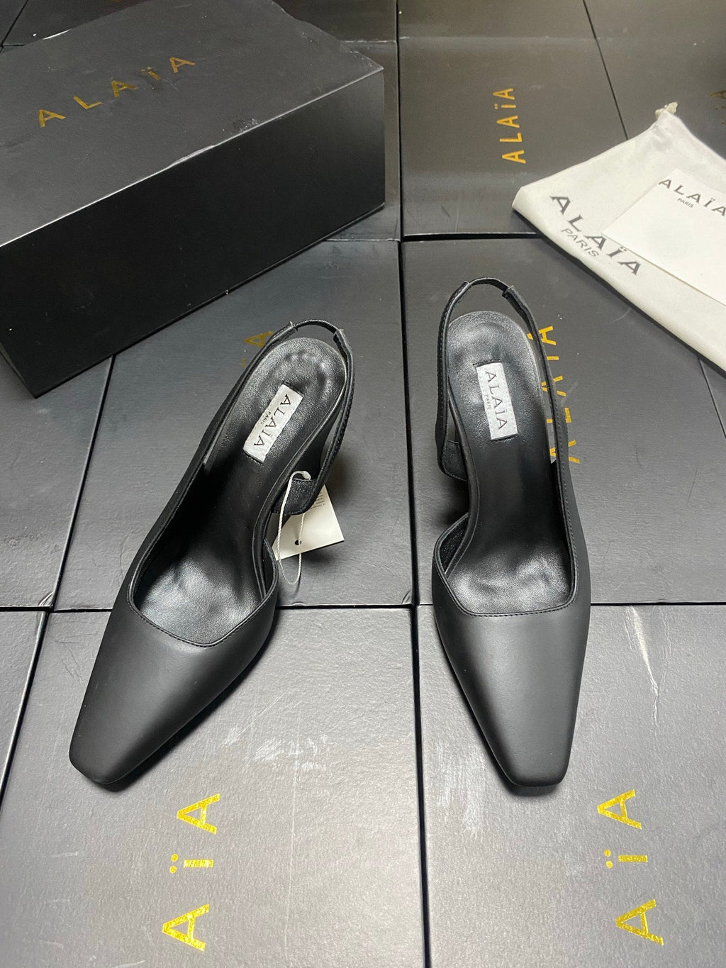 ALAIA 26S WEDGE SLINGBACKS 95 MM IN BLACK CALFSKIN