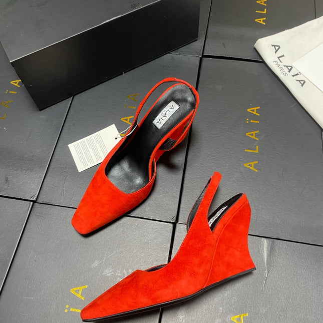 ALAIA 26S WEDGE SLINGBACKS 95 MM IN ORANGE RED SUEDE