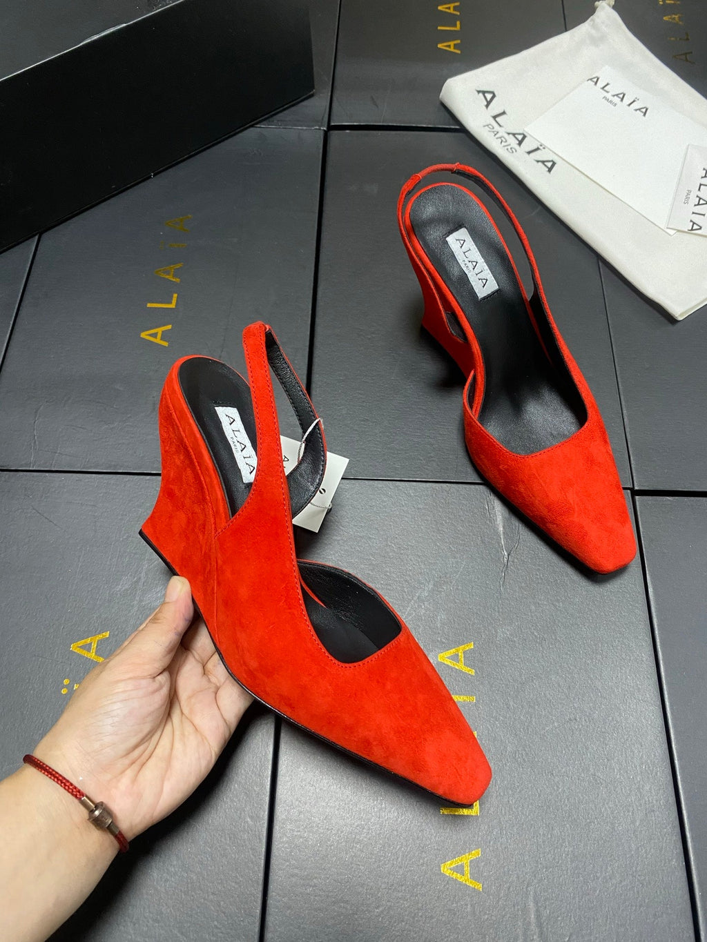 ALAIA 26S WEDGE SLINGBACKS 95 MM IN ORANGE RED SUEDE