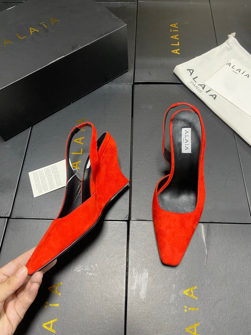 ALAIA 26S WEDGE SLINGBACKS 95 MM IN ORANGE RED SUEDE
