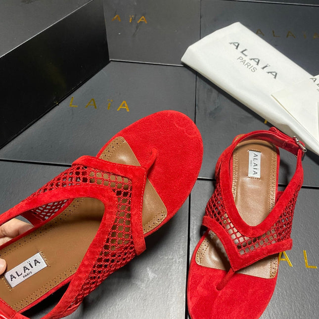 ALAIA 26S FLAT MESH THONG SANDALS IN RED SUEDE