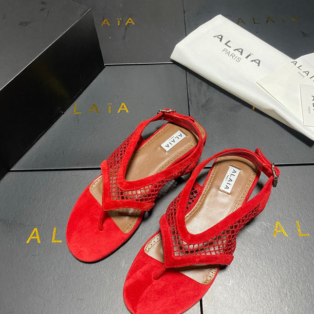 ALAIA 26S FLAT MESH THONG SANDALS IN RED SUEDE