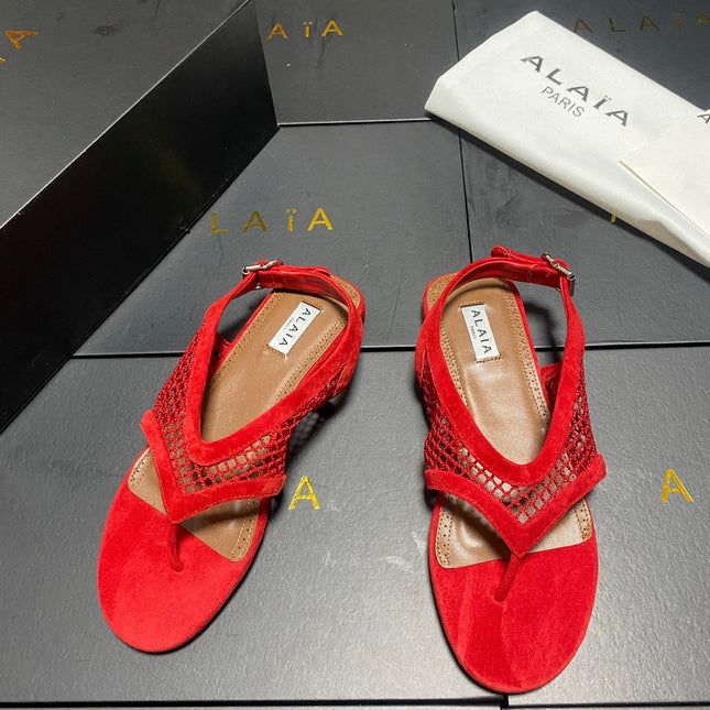 ALAIA 26S FLAT MESH THONG SANDALS IN RED SUEDE