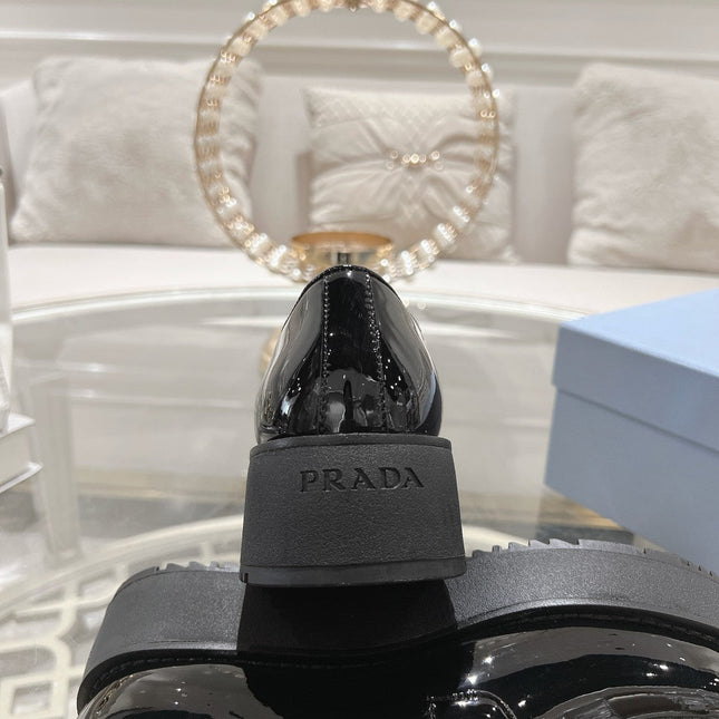 PRADA 26S LOAFERS IN BLACK PATENT CALFSKIN