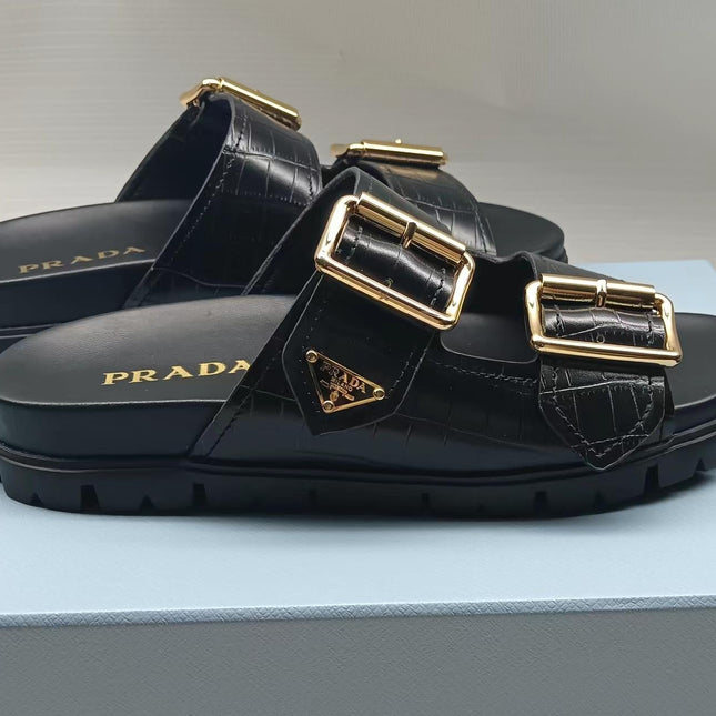 PRADA 26S STRAP SLIDES IN BLACK CROC EMBOSSED CALFSKIN GOLD HARDWARE