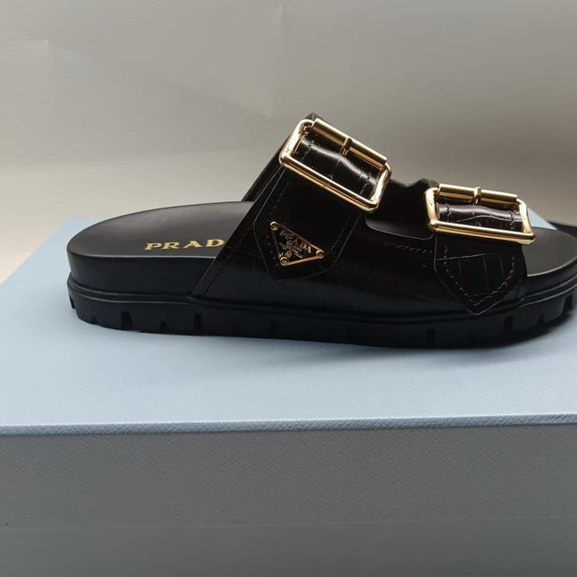 PRADA 26S STRAP SLIDES IN BLACK CROC EMBOSSED CALFSKIN GOLD HARDWARE