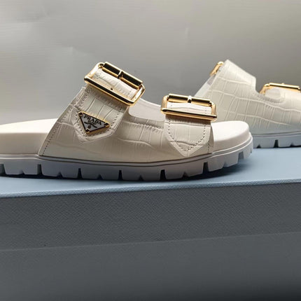 PRADA 26S STRAP SLIDES IN IVORY WHITE CROC EMBOSSED CALFSKIN GOLD HARDWARE