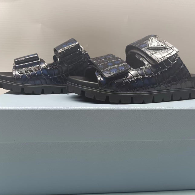 PRADA 26S STRAP SLIDES IN BLACK CROC EMBOSSED CALFSKIN
