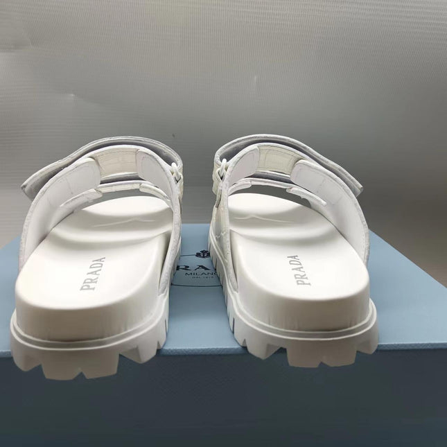 PRADA 26S STRAP SLIDES IN IVORY WHITE CROC EMBOSSED CALFSKIN