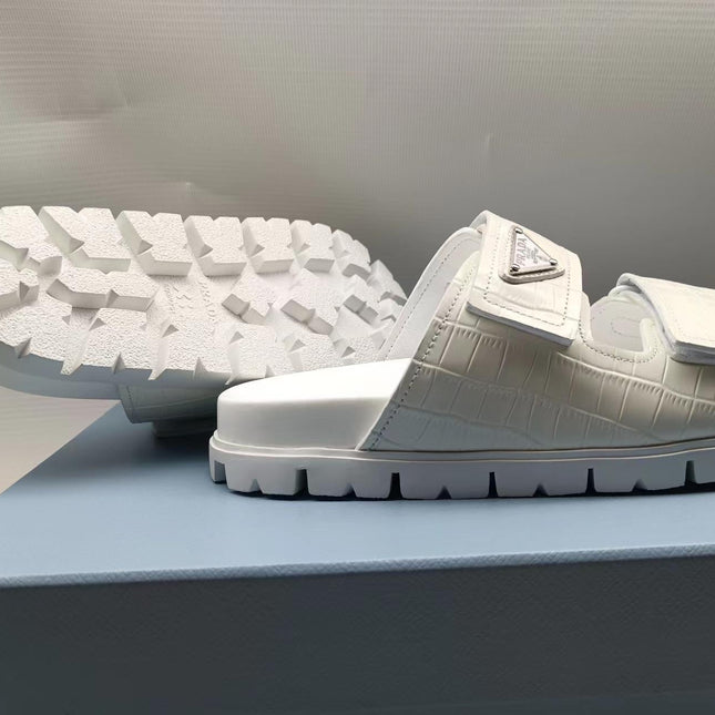 PRADA 26S STRAP SLIDES IN IVORY WHITE CROC EMBOSSED CALFSKIN