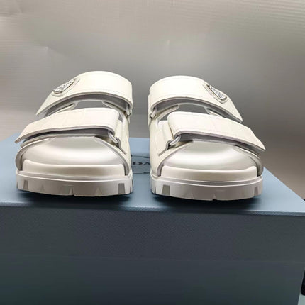 PRADA 26S STRAP SLIDES IN IVORY WHITE CROC EMBOSSED CALFSKIN