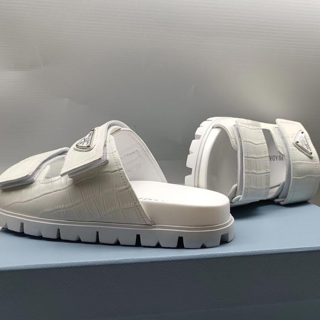PRADA 26S STRAP SLIDES IN IVORY WHITE CROC EMBOSSED CALFSKIN