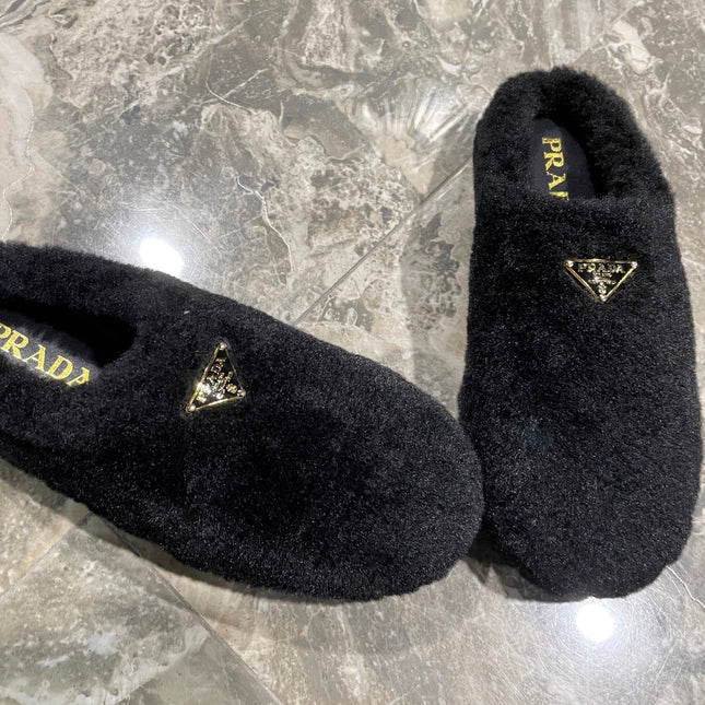PRADA 26S SLIPPERS IN BLACK WOOL