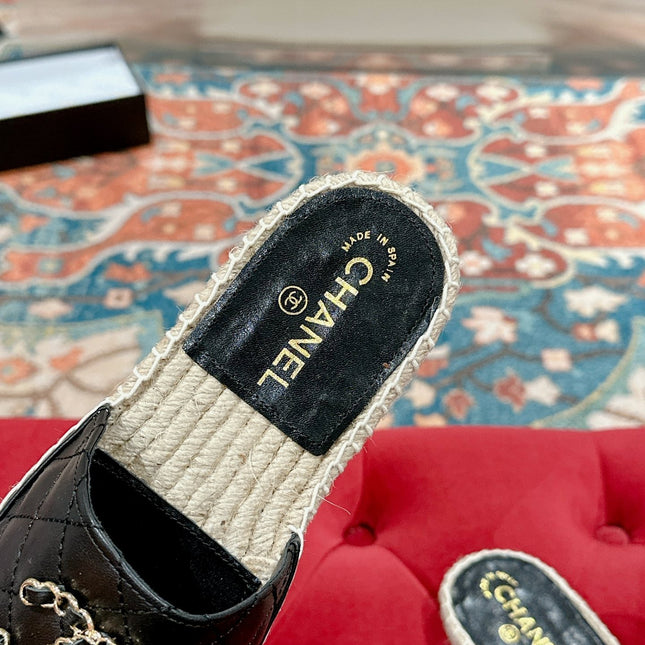 FLAT SLIPPERS IN BLACK LAMBSKIN AND WOVEN WITH LOGO