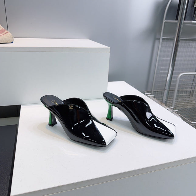 CHANEL 26S HIGH-HEEL MULES 70 MM IN BLACK AND WHITE LAMBSKIN
