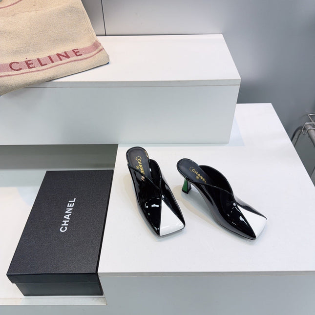 CHANEL 26S HIGH-HEEL MULES 70 MM IN BLACK AND WHITE LAMBSKIN