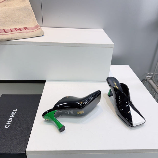 CHANEL 26S HIGH-HEEL MULES 70 MM IN BLACK AND WHITE LAMBSKIN