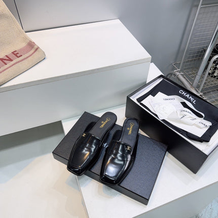 CHANEL 26S LOAFER MULES IN BLACK PATENT LAMBSKIN