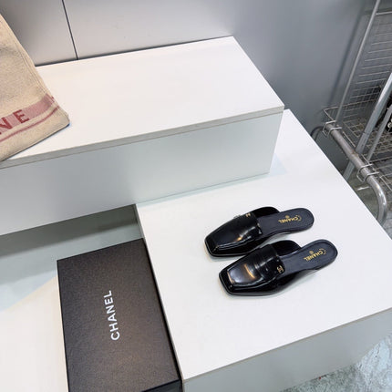 CHANEL 26S LOAFER MULES IN BLACK PATENT LAMBSKIN