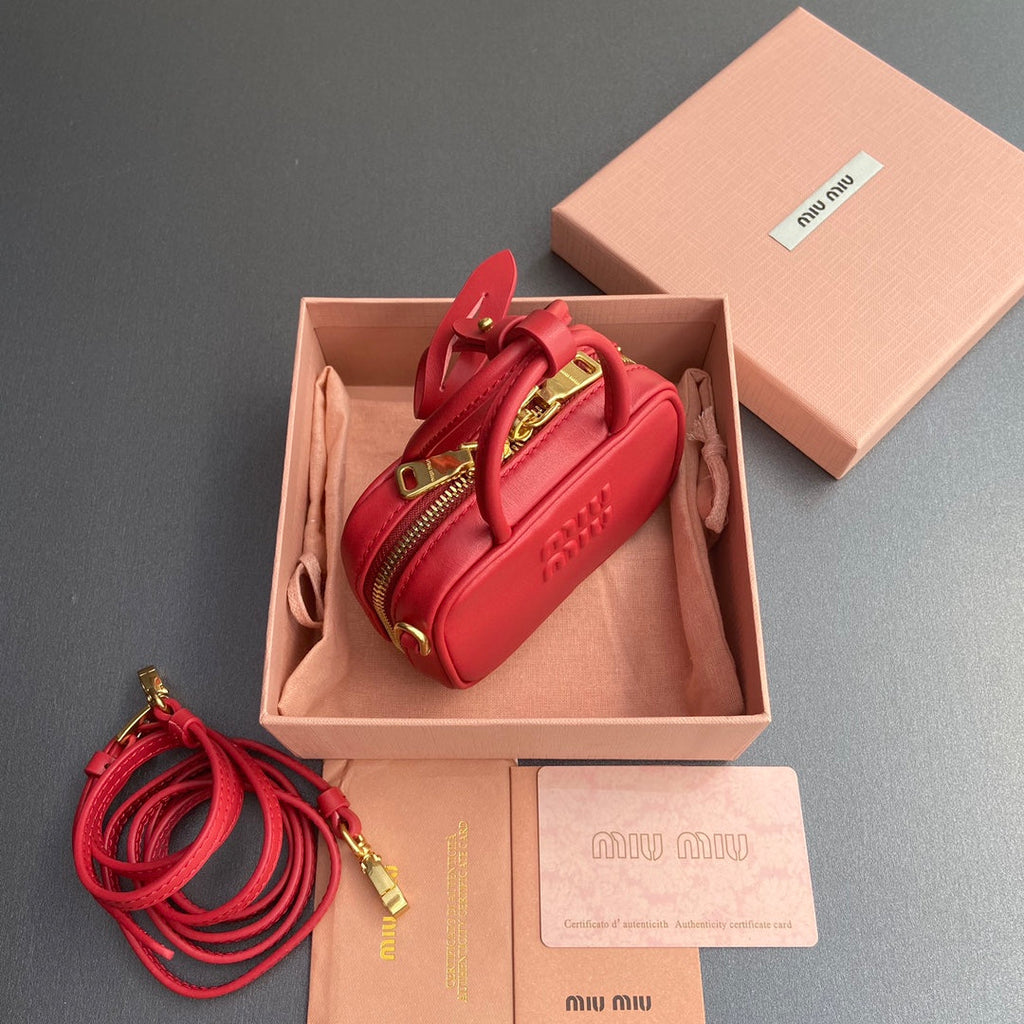 MICRO BAG KEYCHAIN 11 IN TALL POPPY RED CALFSKIN EMBOSSED LOGO