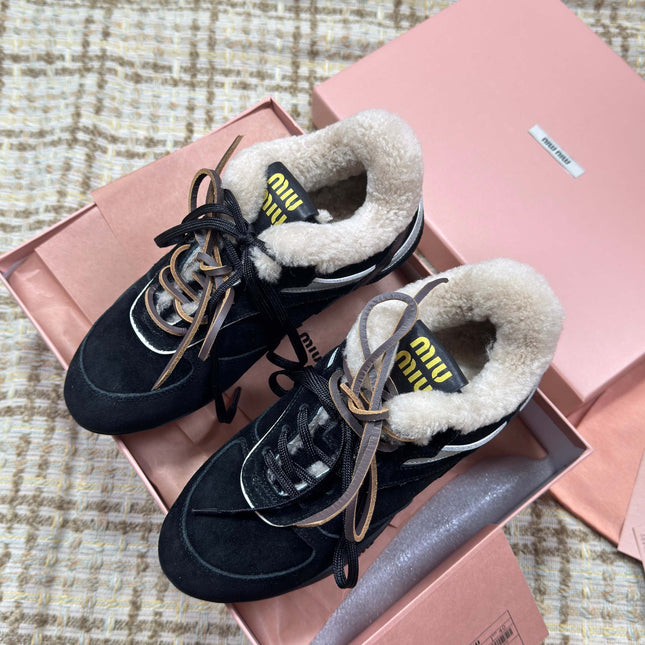 MIUMIU 26S SNEAKERS IN BLACK SUEDE AND SHEARLING