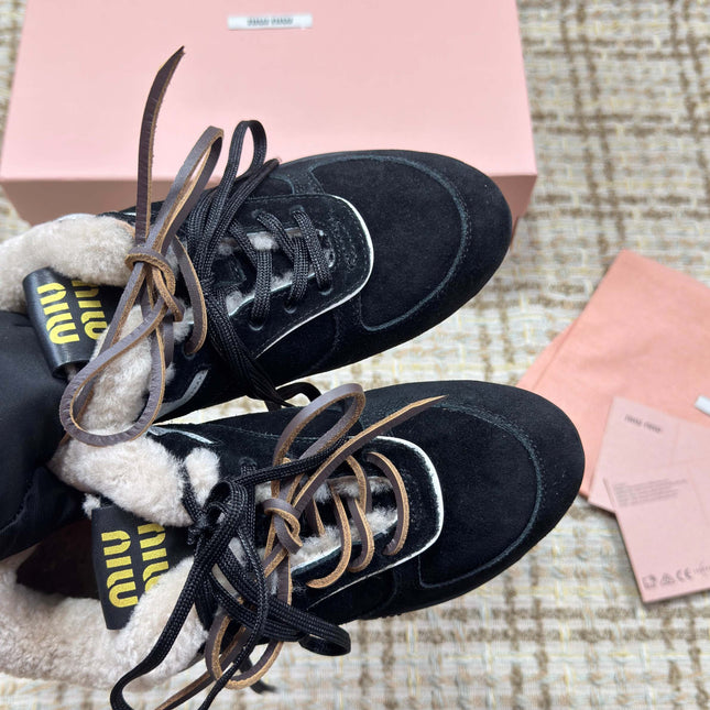 MIUMIU 26S SNEAKERS IN BLACK SUEDE AND SHEARLING