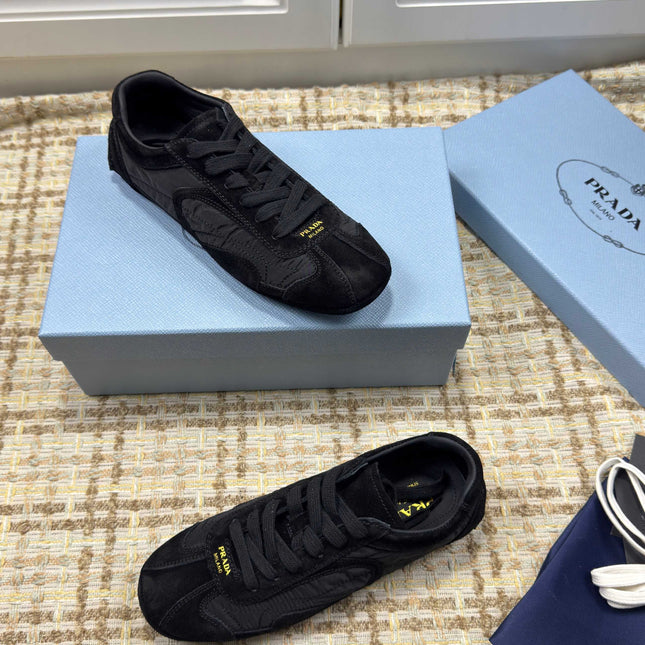 PRADA 26S LOW TOP SNEAKERS IN BLACK NYLON AND SUEDE