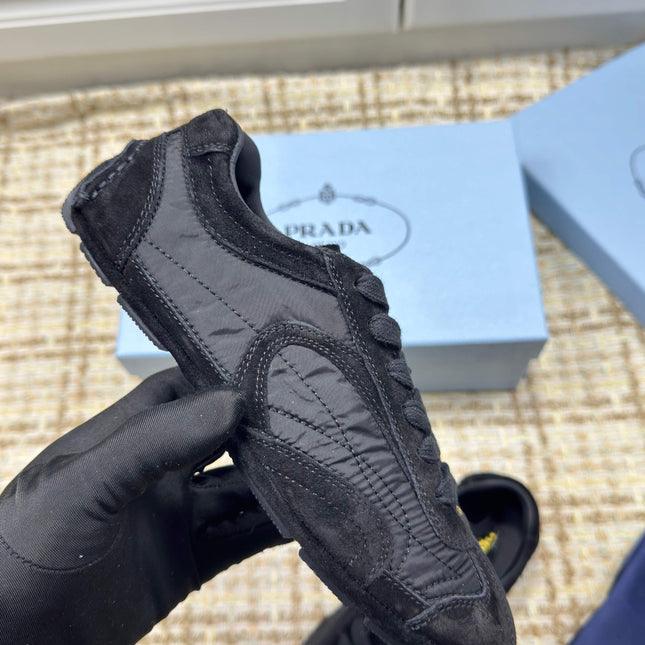 PRADA 26S LOW TOP SNEAKERS IN BLACK NYLON AND SUEDE