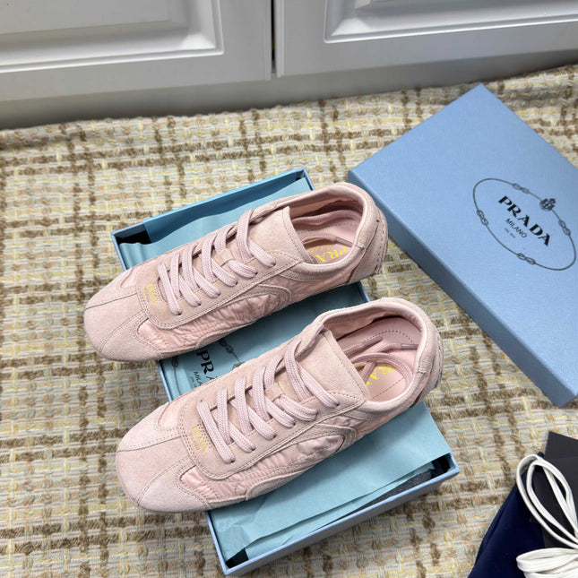 PRADA 26S LOW TOP SNEAKERS IN PINK NYLON AND SUEDE