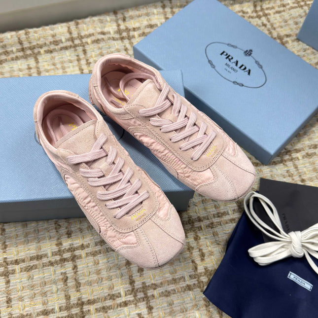 PRADA 26S LOW TOP SNEAKERS IN PINK NYLON AND SUEDE